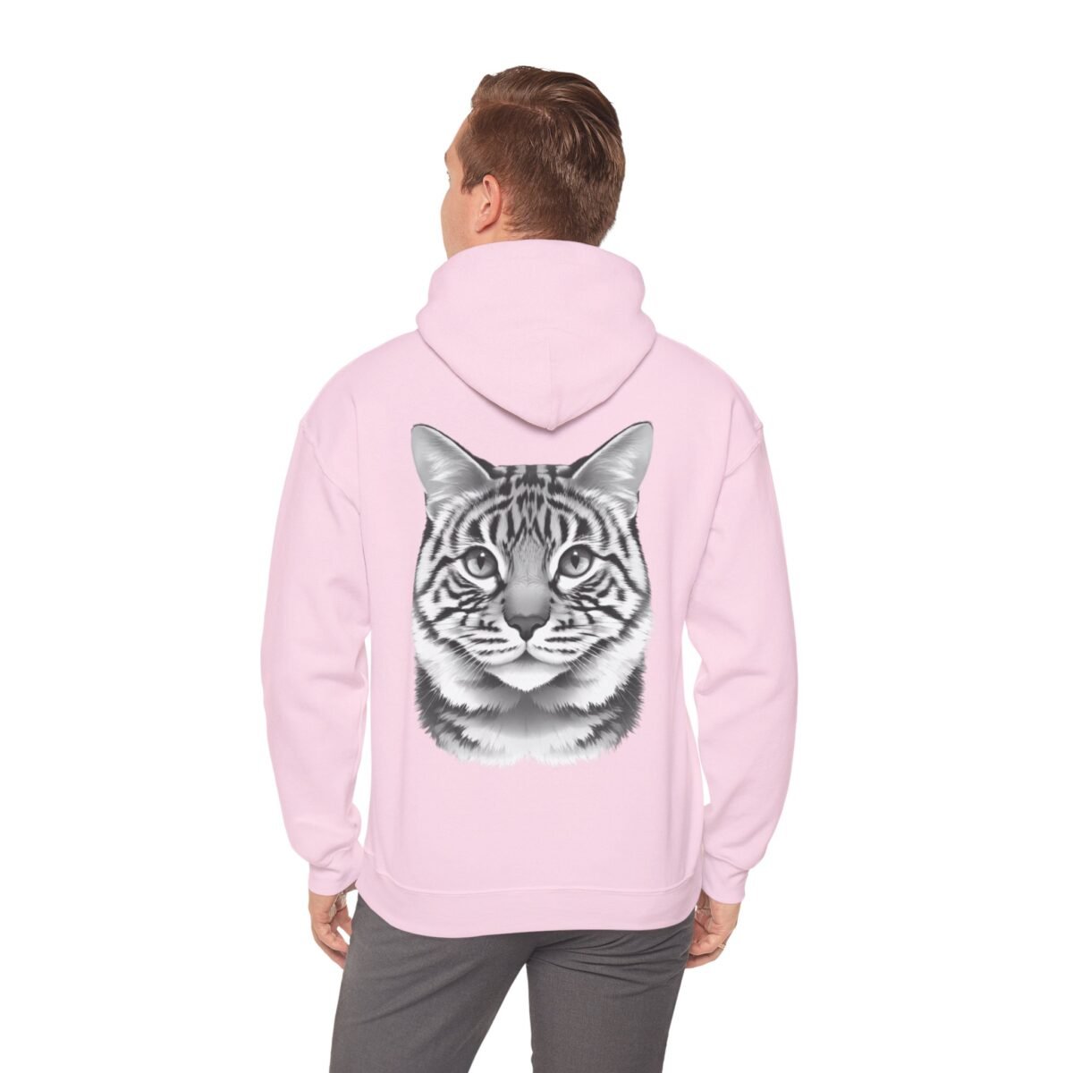 16742917664978690689_2048.jpeg Back of a person wearing a pink hoodie with a striped cat face design.