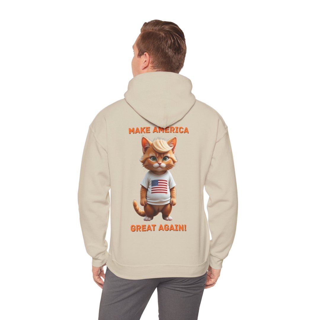 1865953733675414332_2048.jpeg Person wearing hoodie with cartoon cat and 'Make America Great Again' text.