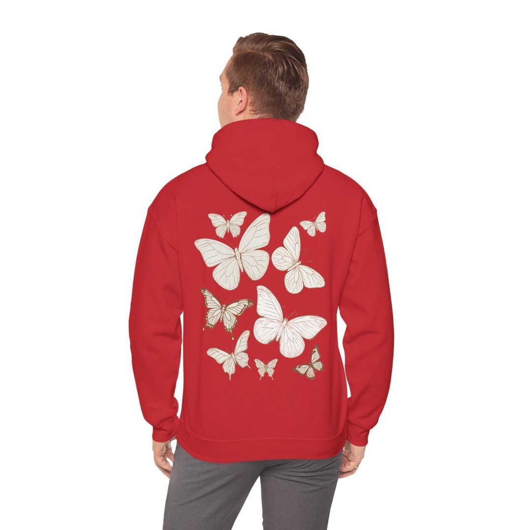 2136218667555762830_2048.jpeg Person wearing a red hoodie with white butterfly designs on the back.