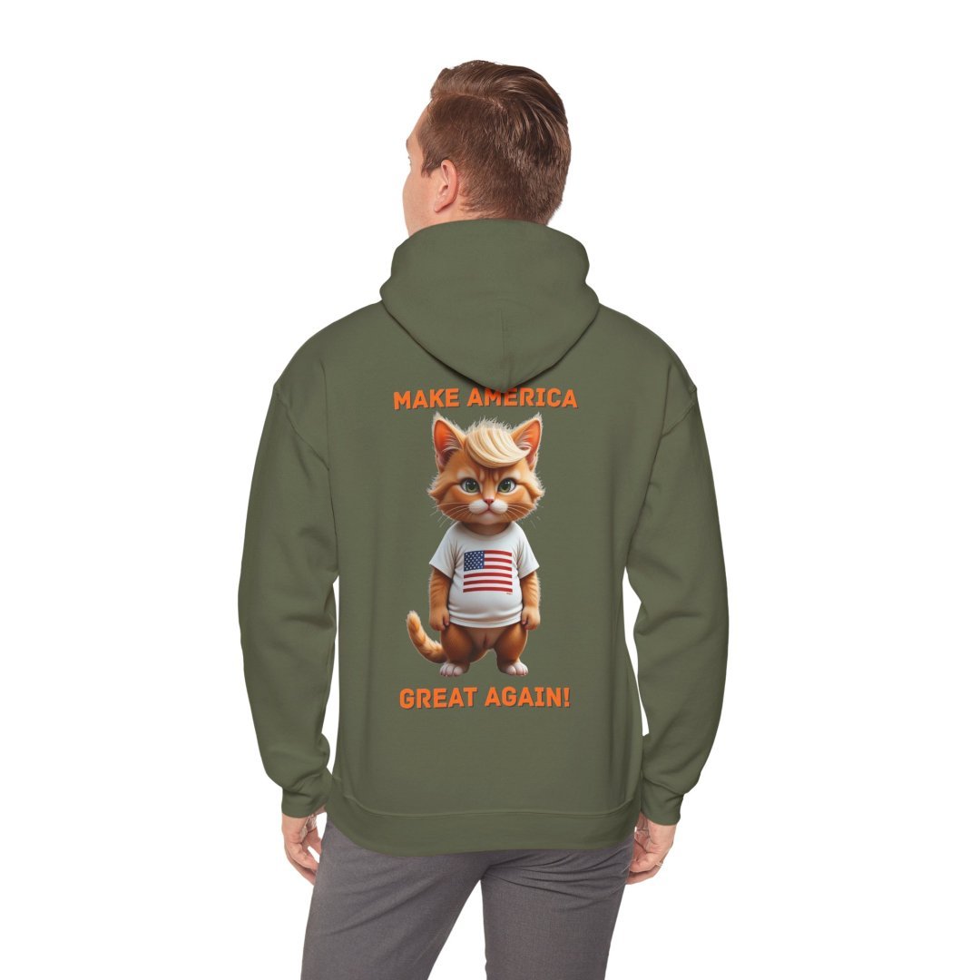 7946566604745644582_2048.jpeg Man wearing a hoodie with a cartoon cat and 'Make America Great Again' text.