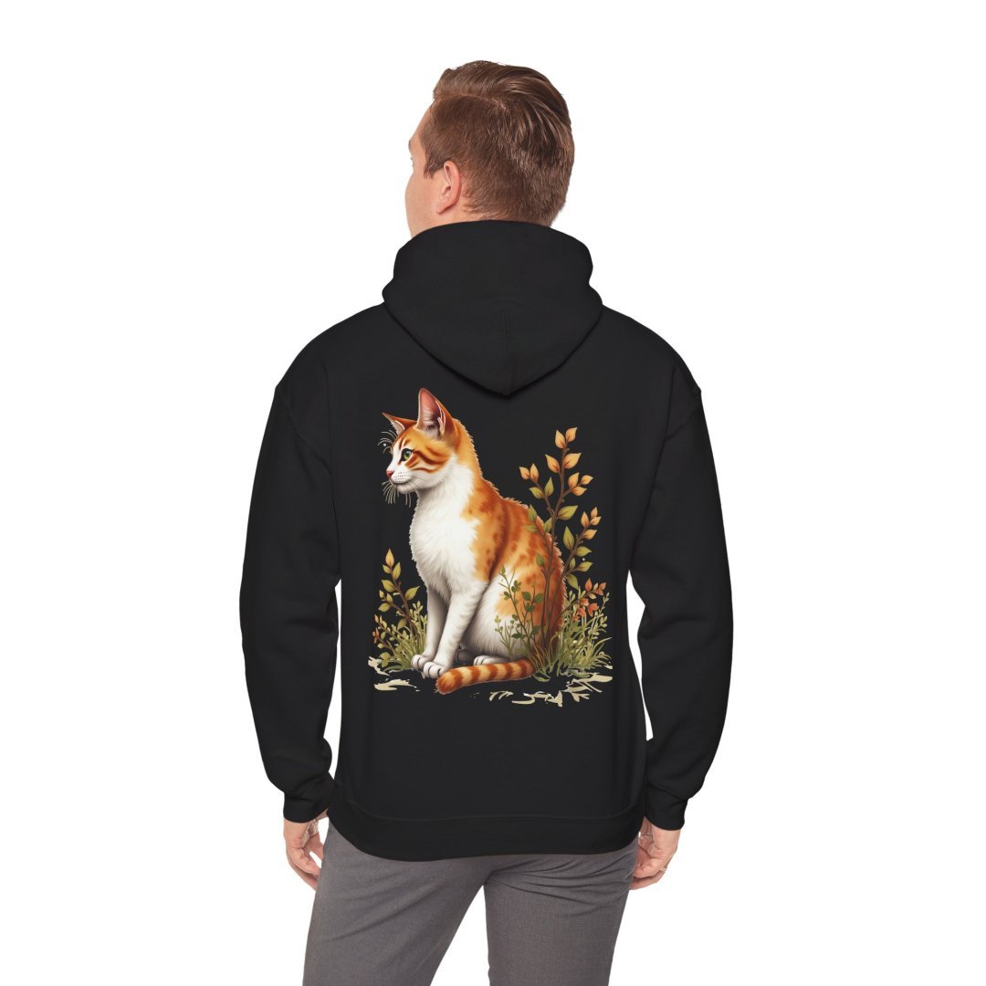 9586301124969977534_2048.jpeg Man wearing a black hoodie with a cat design on the back.